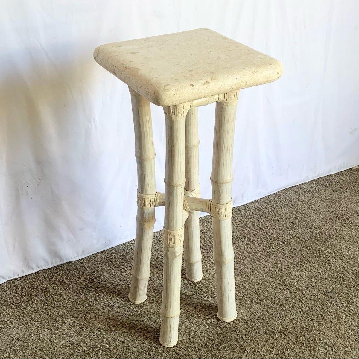 Boho Coastal Bamboo Stone Side Table blends artisan bamboo structure with sculptural stone top for refined coastal elegance in luxe interiors.
 

 We sell items as acquired, without restoring or repairing. Vintage pieces may have age-related wear.