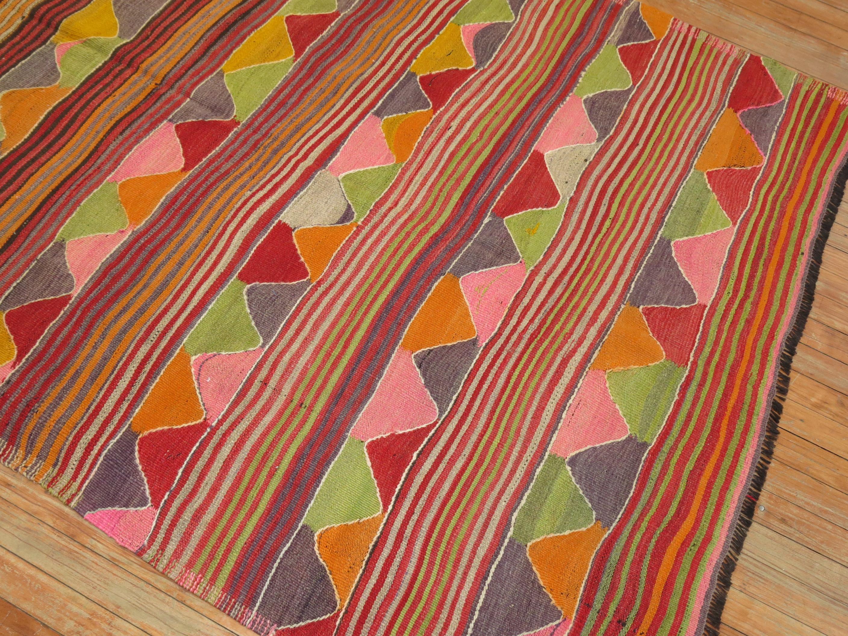 Colorful mid-20th century Turkish flat-weave Kilim.

Measures: 4'11'' x 8'1''