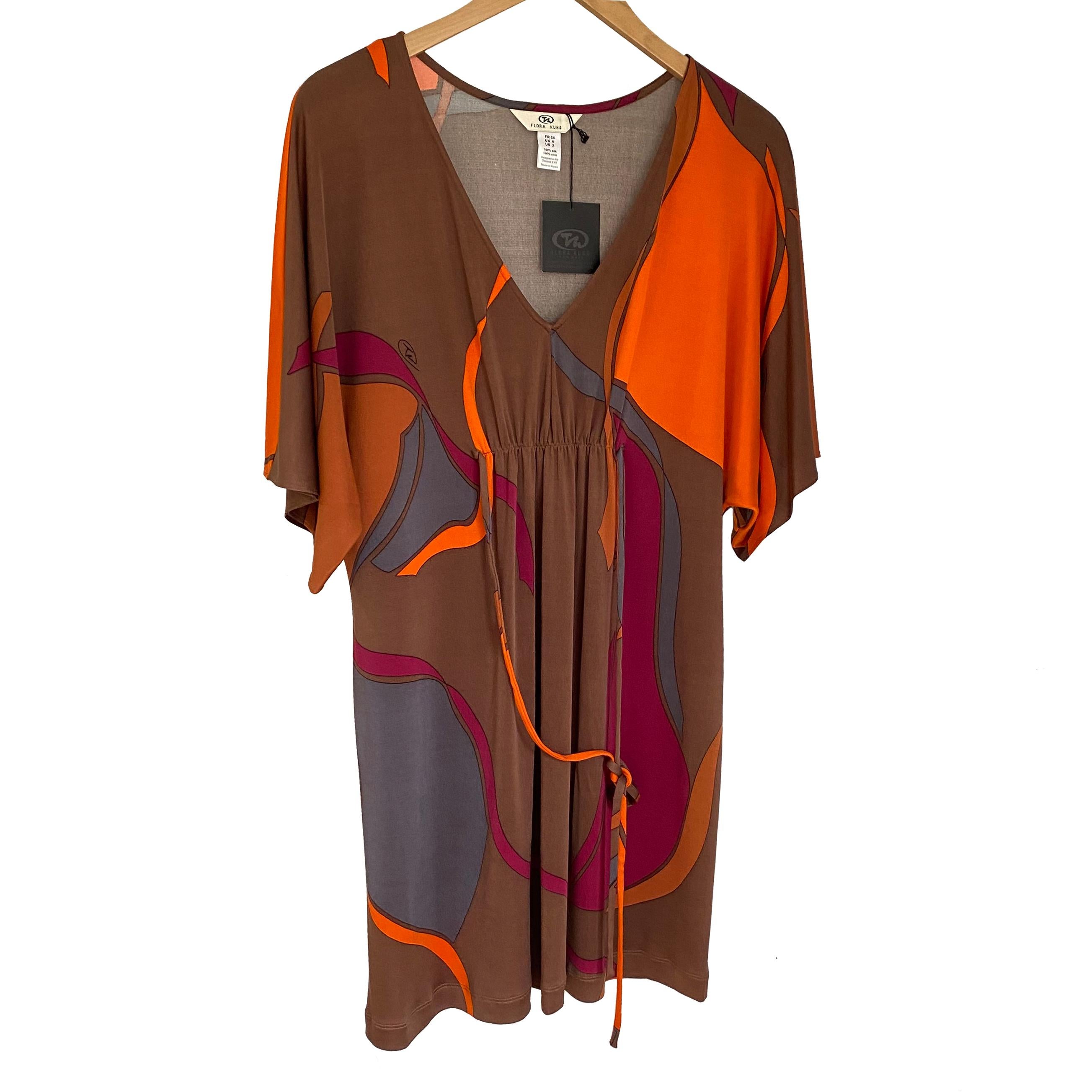 Easy V-neck silk jersey caftan. 
Can be tied at front or back.
Original huge petal print from Flora Kung.
Approximately 34