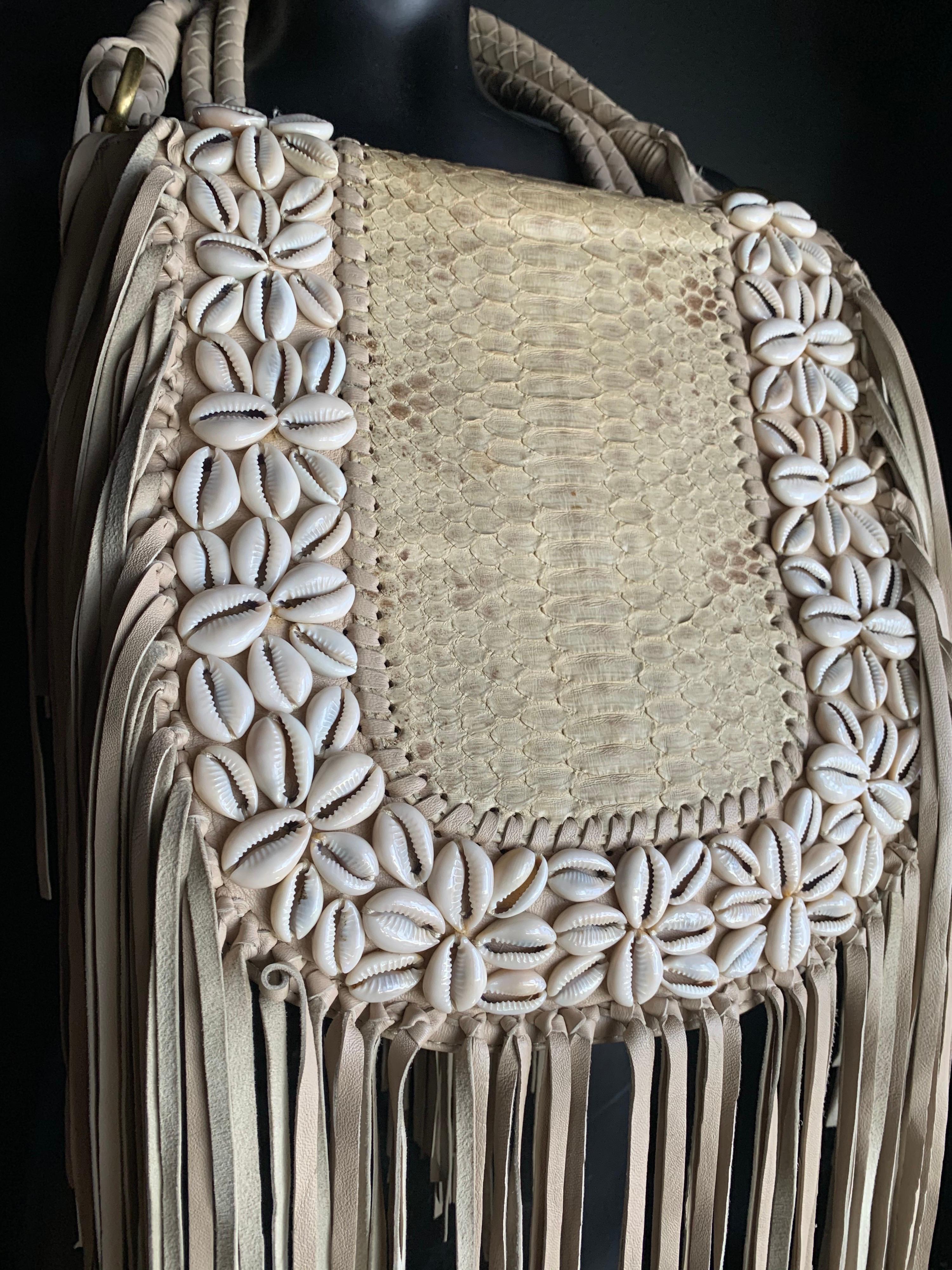 A Bohemian-styled fringed leather shoulder bag with multi-strand 