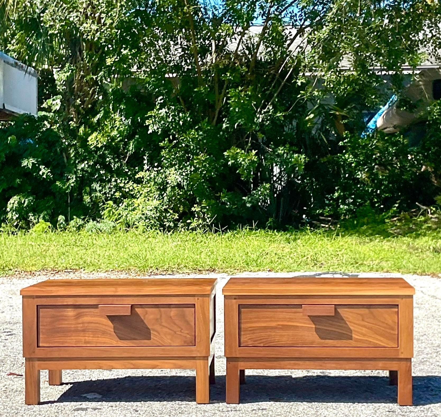 A fabulous pair of vintage Boho nightstands. A chic low profile design with beautiful wood grain detail. Acquired from a NY estate.