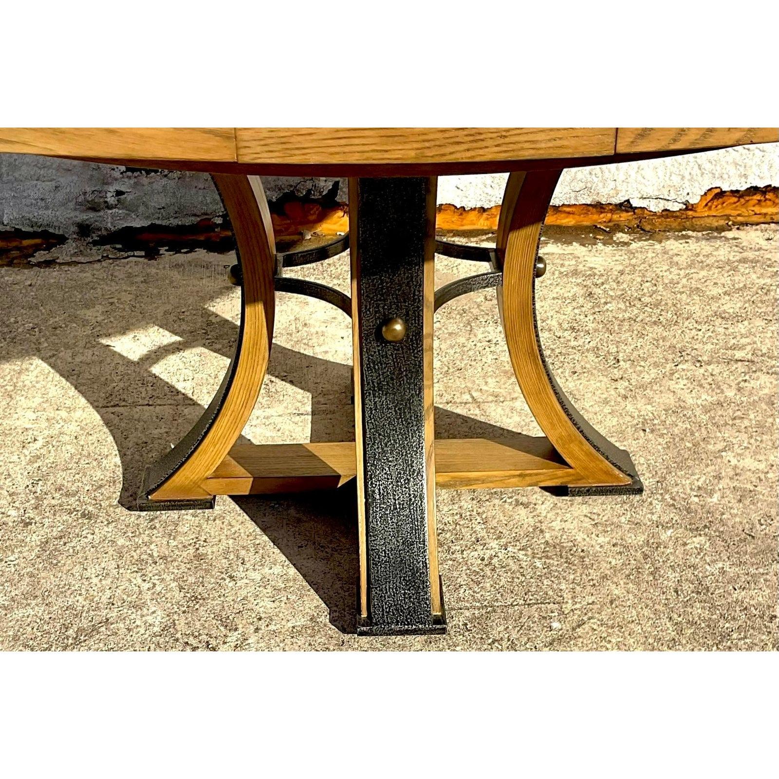 Elevate your dining experience with our Vintage Boho Sarreid IMF Tower Jupe Extendable Dining Table. This distinctive piece combines bohemian flair with timeless elegance, featuring an extendable design perfect for versatile entertaining. Its