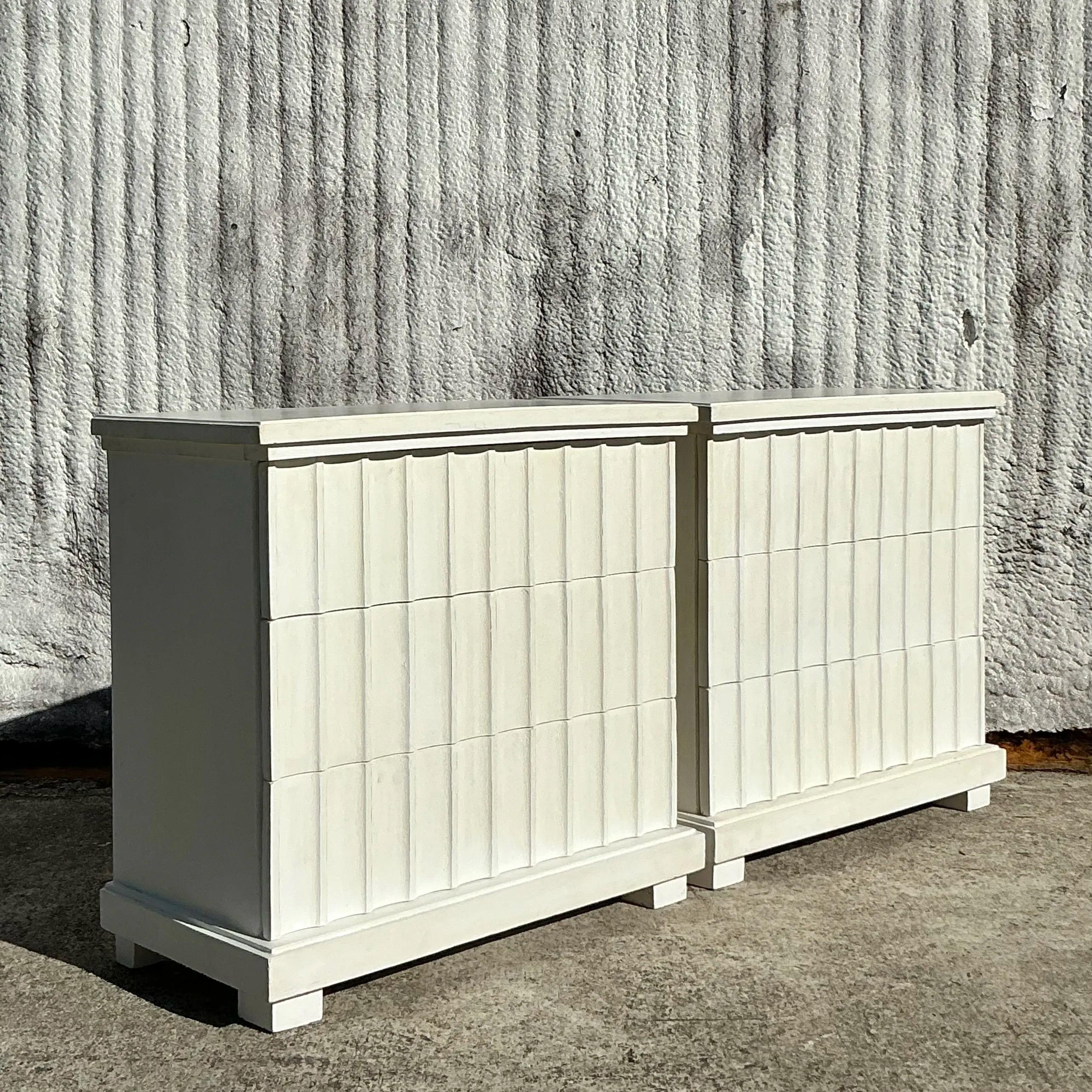 Pair of vintage boho chest of drawers featuring unique scalloped detailing for a whimsical, artistic touch. Crafted with a blend of practicality and style, these chests offer ample storage while serving as standout pieces in any bohemian or eclectic