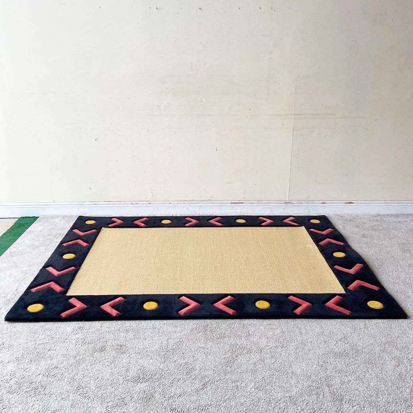 Amazing vintage Boho Chic meats southwestern meats Memphis style rectangular area rug. Features a natural fiber, jute-like, center bordered by a black edge with red arrows and yellow circles throughout.

Rug 5
