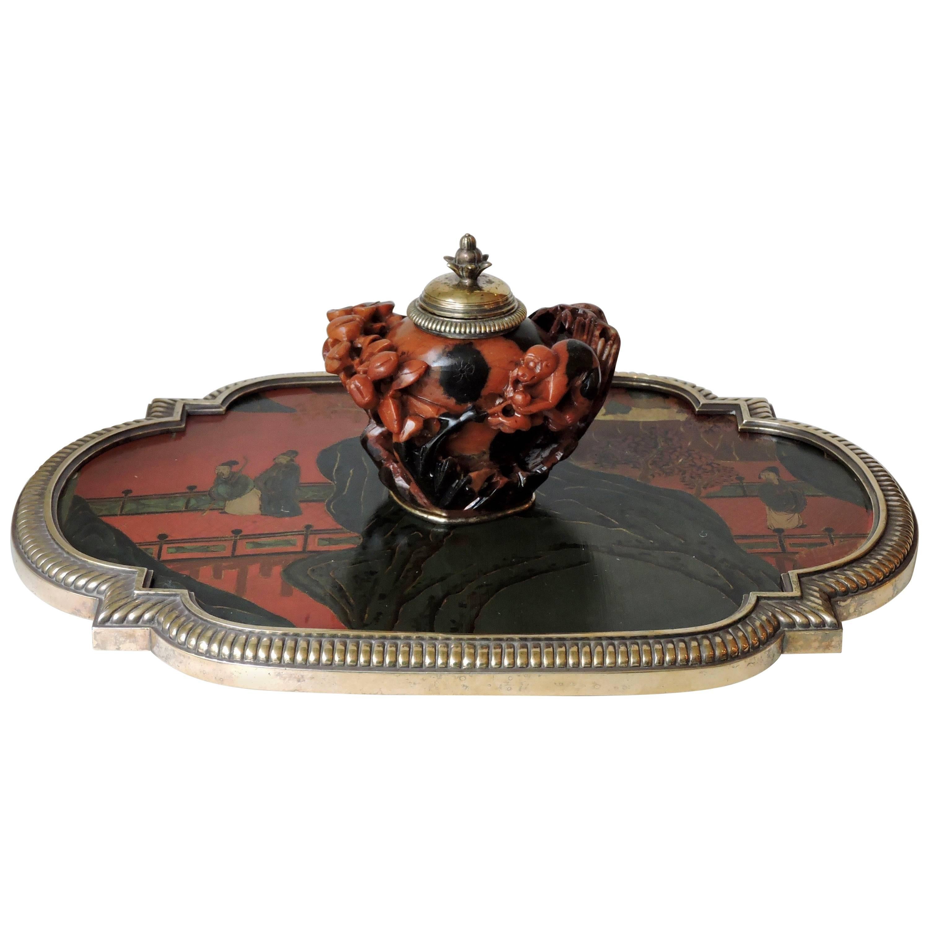 Open- worked carved monkey design soapstone inkwell (steatite)
Resting on a red and gold china lacquer tray designed with characters on a bridge.
Mount of tray and inkwell bronze godrons
Signed Boin-Taburet in Paris and Numbered 78878 53,
circa