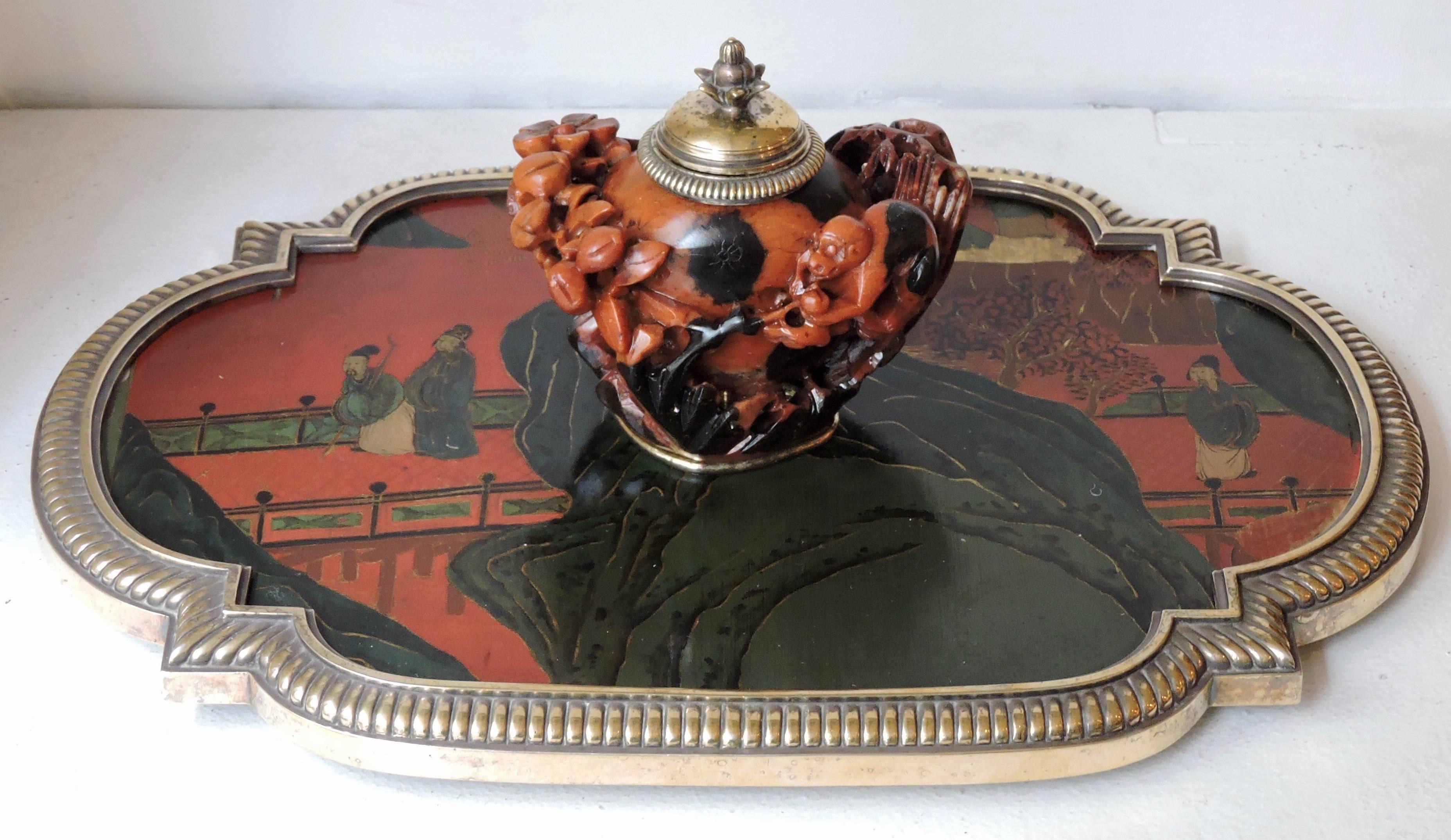 Open-Worked Carved Monkey Design Soapstone Inkwell (Steatite) 
Resting on a Red and Gold China Lacquer Tray designed with characters on a bridge. 
Mount of tray and inkwell bronze godrons 
Signed Boin-Taburet in Paris and Numbered 78878 53 
Circa