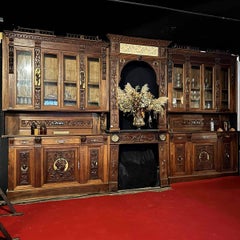 Louis XIII-style Norman walnut and gilded library woodwork