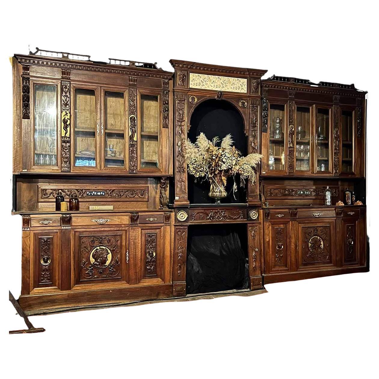 Louis XIII-style Norman walnut and gilded library woodwork