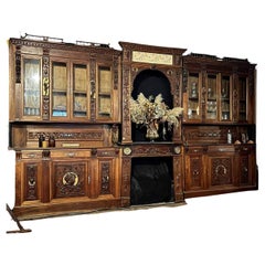 Louis XIII-style Norman walnut and gilded library woodwork