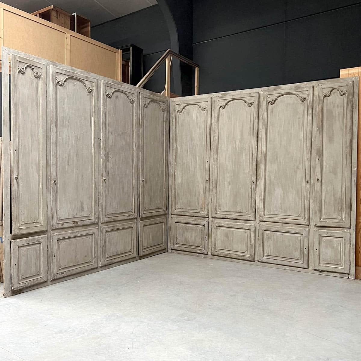 Sublime Louis XV style woodwork for a storage front, finely carved and patinated, offering timeless elegance and authentic charm. This superb solid wood set features delicate moldings and refined ornaments that will blend perfectly into a classic