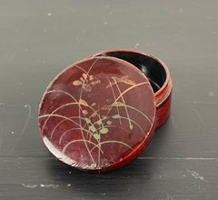 Small red round medicine box, Japan - Late 19th century