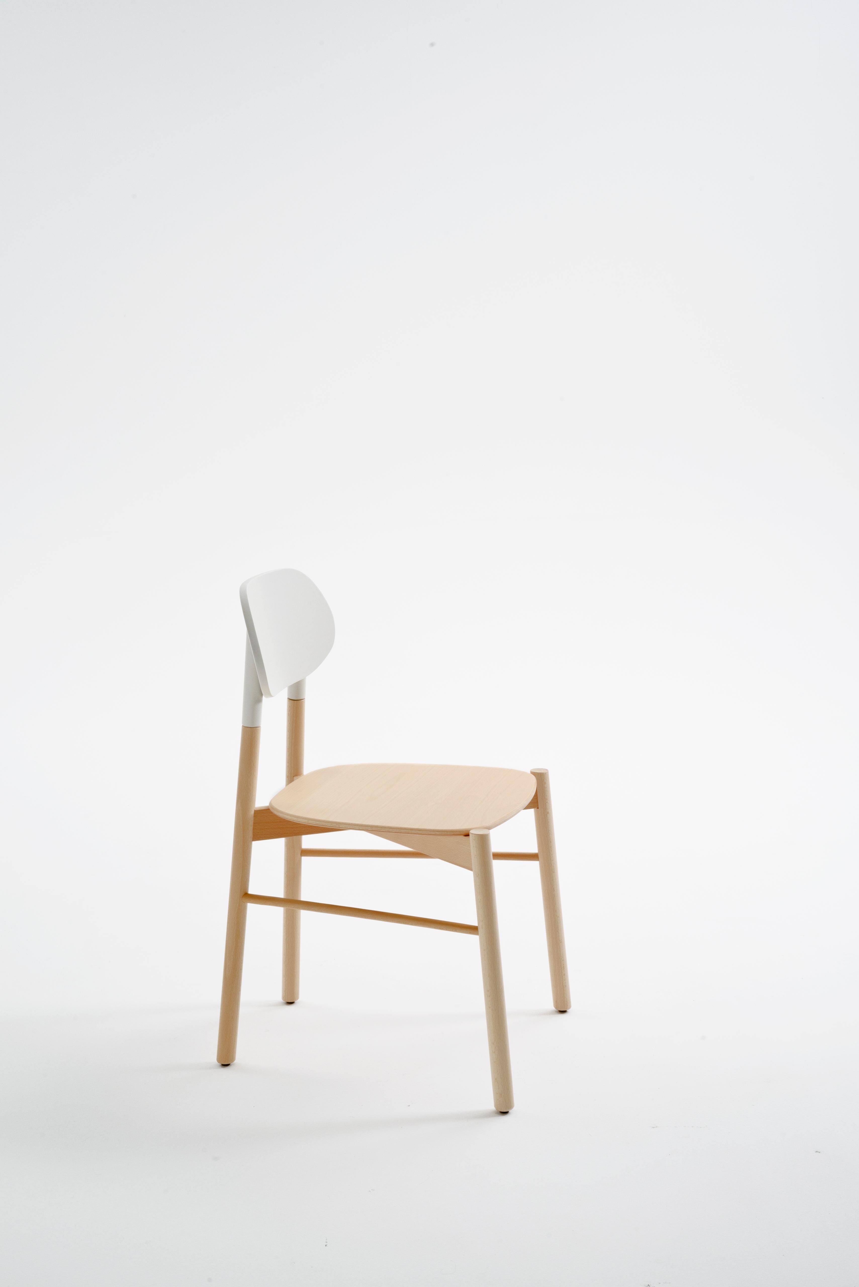 An essential chair in the form, yet precious in colors. Tapered and elongated, the legs of the seat are inspired by the bokken, a wooden replica of the Japanese sword used in the training of the Japanese martial art of Aikido and Kendo.
Bokken