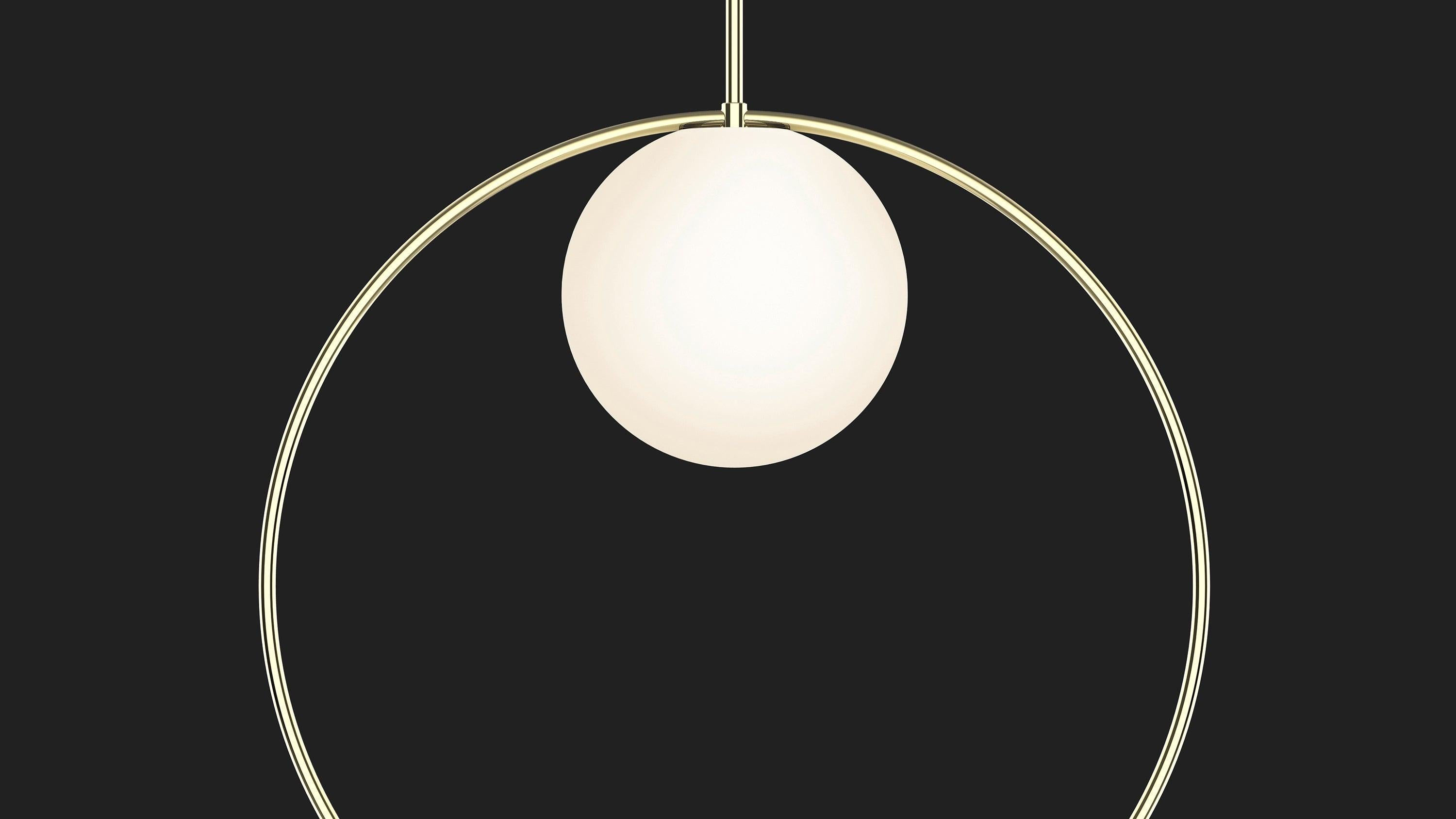 Taking its inspiration from pendant jewelry, Bola Halo is a uniquely expressive pendant light featuring a chromated ring that balances delicately over its elegant opal glass shade while allowing its surroundings to shine through. Available in 3