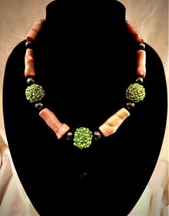 Bold and beautiful exotic necklace of coral and peridots