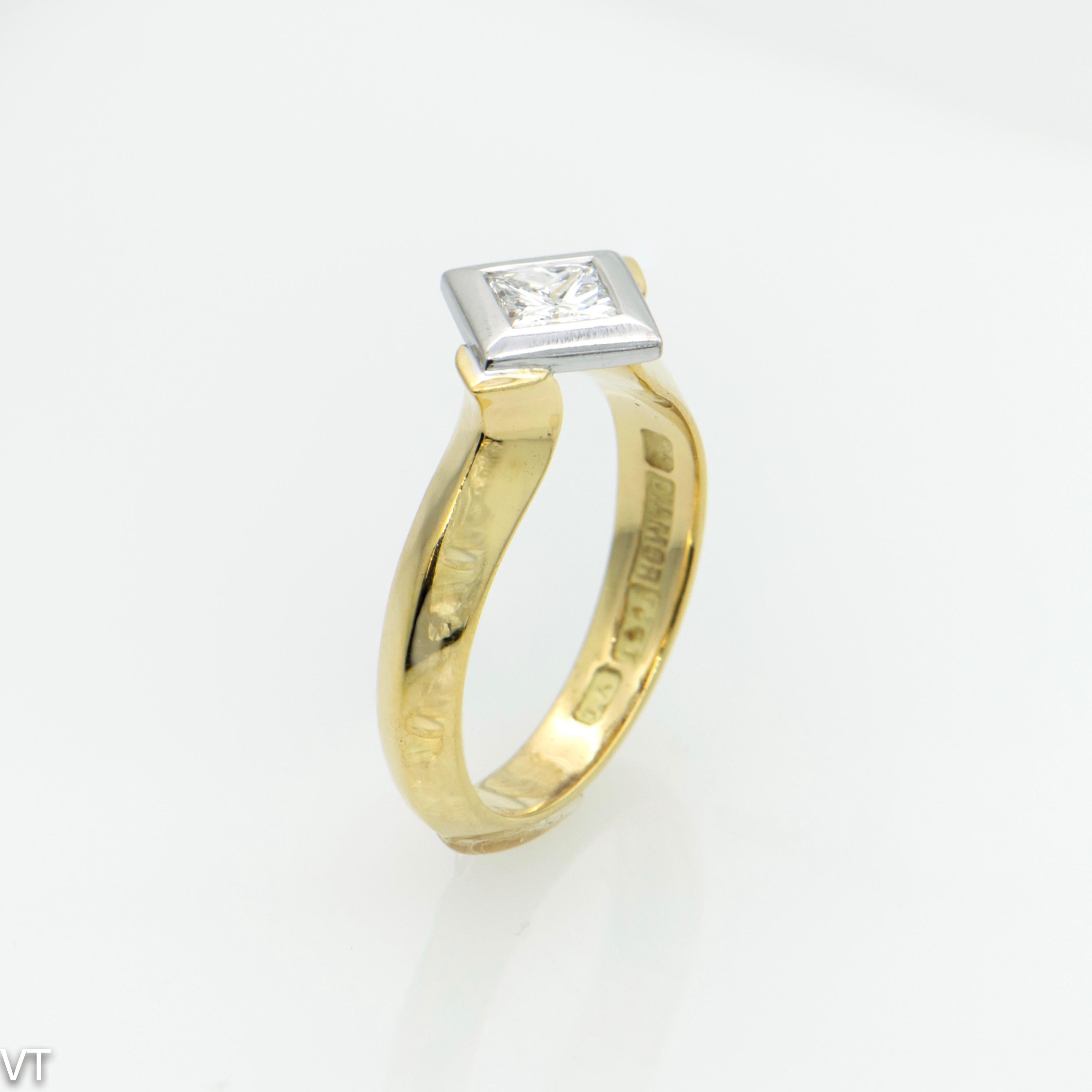Bold and elegant 18 carat yellow gold engagement ring
with one princess-cut Diamond in 18 carat white gold Rub-over setting .
Stylish knife-edge band.
Diamond size is 0.52 carats, Colour H and Clarity VS.
Ring Size is M (US size 6 1/4)
Weight of the