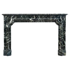 Bold Antique French Baroque Bolection Fireplace in Green Marble