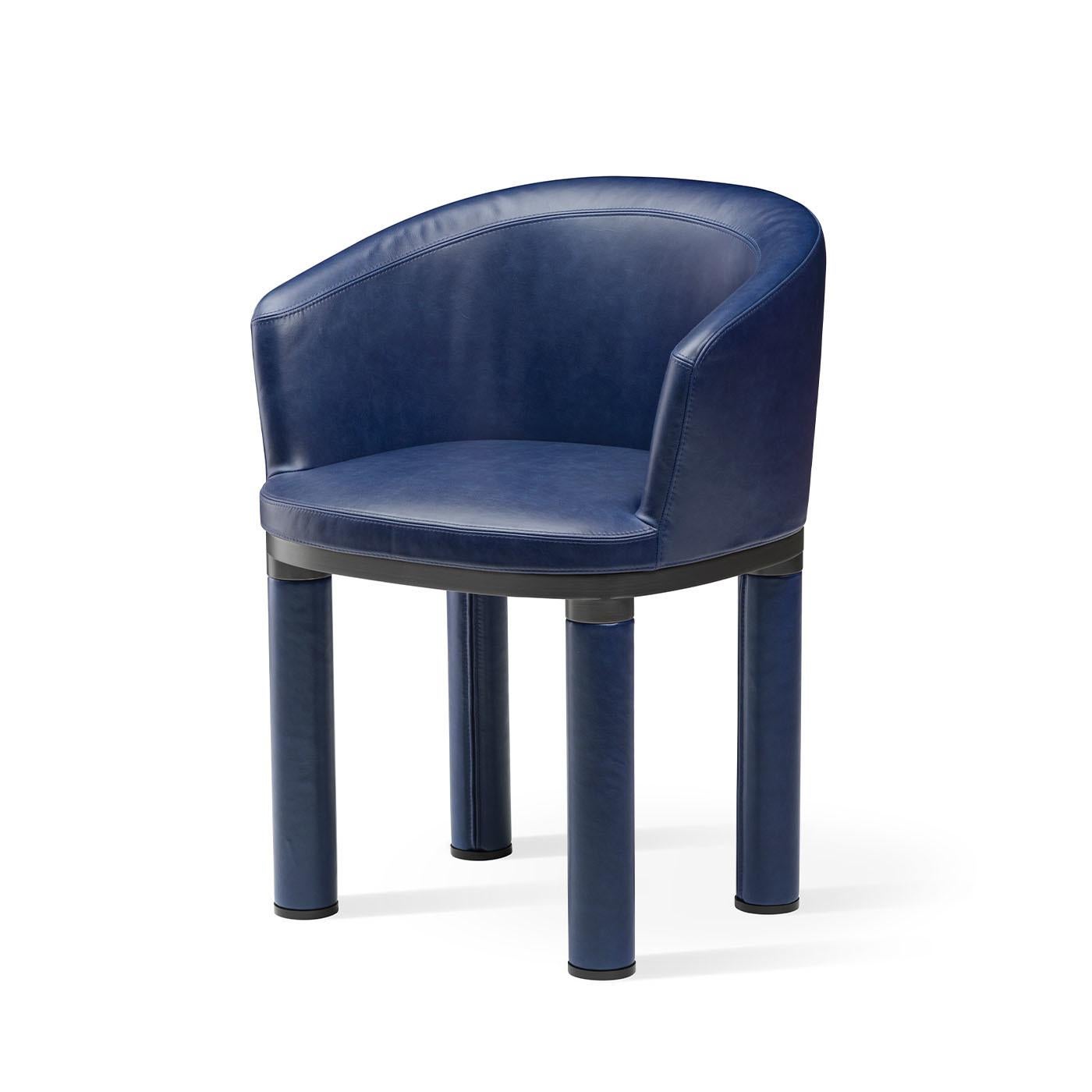 Elegant in its simplicity, this magnificent armchair is a study in modern sophistication. Resting on a black satin-finished brass structure, it features four sturdy cylindrical legs partially upholstered and an enveloping seat with curved backrest,