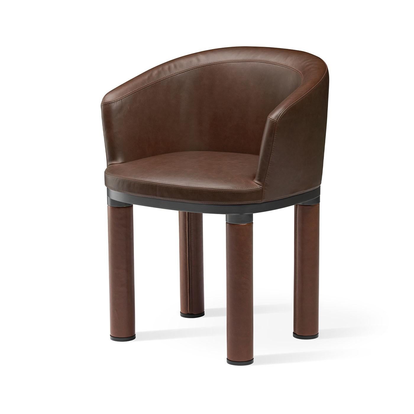 A superb addition to both modern and traditional decors, this armchair flaunts a charming and stylish design inspired by balanced proportions and classic silhouettes. Almost entirely upholstered in dark-brown leather, its sinuous and welcoming shape