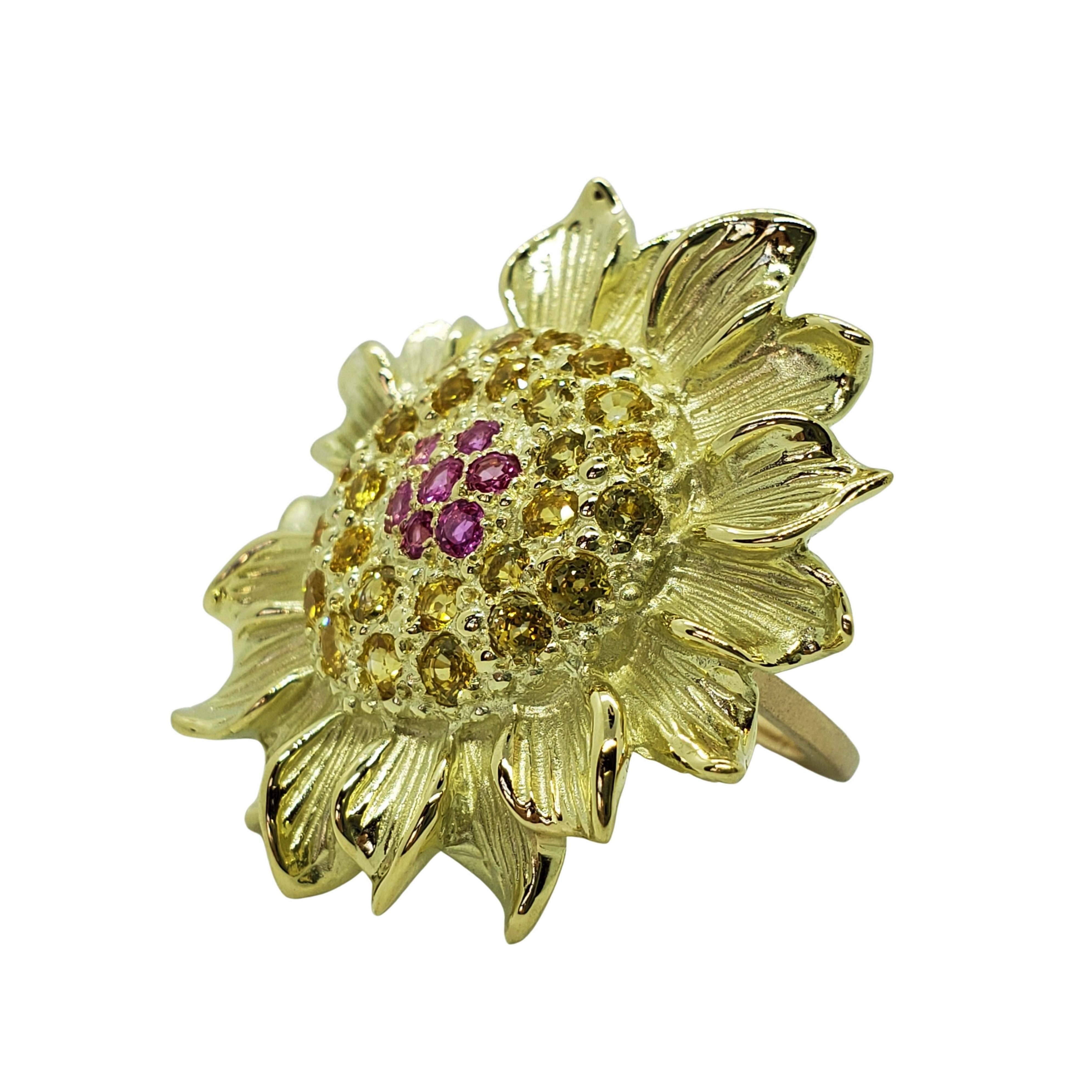 Realistically sculpted Sunflower ring in 14K green gold with pink and yellow sapphires. Bold is not a strong enough descriptive, this ring will get alot of eyes on it and conversations started. A favorite of clients for the artistic interpretation