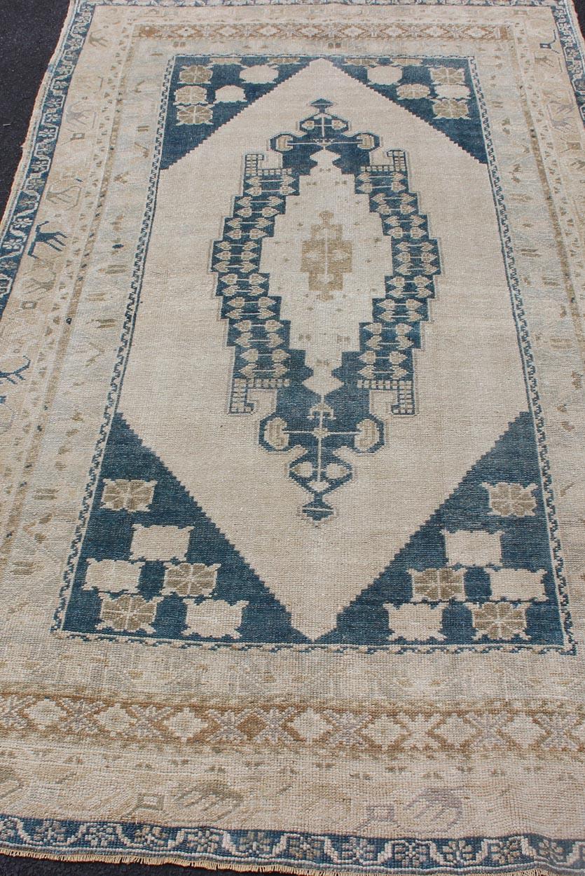 20th Century Bold Design Blue,  Brown, Tan, Turkish Oushak with Stretched Medallion