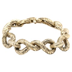 Bold Figure Eight Link Bracelet, 14K Yellow Gold, Length 7.5 Inches, Textured 
