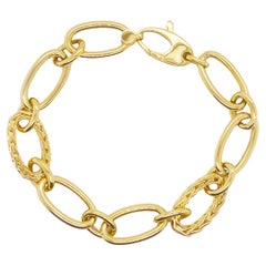 Atrevida Pulsera de Oro con Trigo y Eslabones Pulidos en Oro Amarillo de 14K