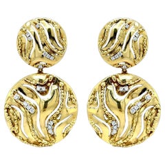 Orecchini a goccia in oro con diamante