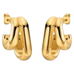 Auffällige Statement-Creolen aus 14-karätigem Gelbgold mit geschwungenem Design
