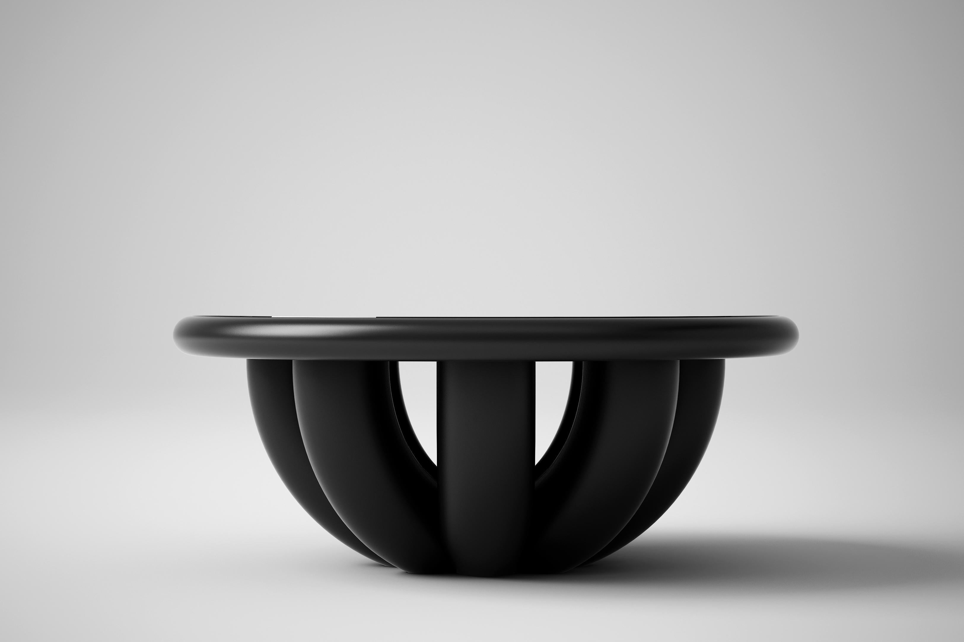 Bold low table by Tolga Sencer
Dimensions: 35 x 35 x 85 cm
Materials: black lacquer wood, black glass over wood top

In Bold Collection, bodies have strong symmetrical structures. Rotations of thick and broad elliptic lines on a single axis