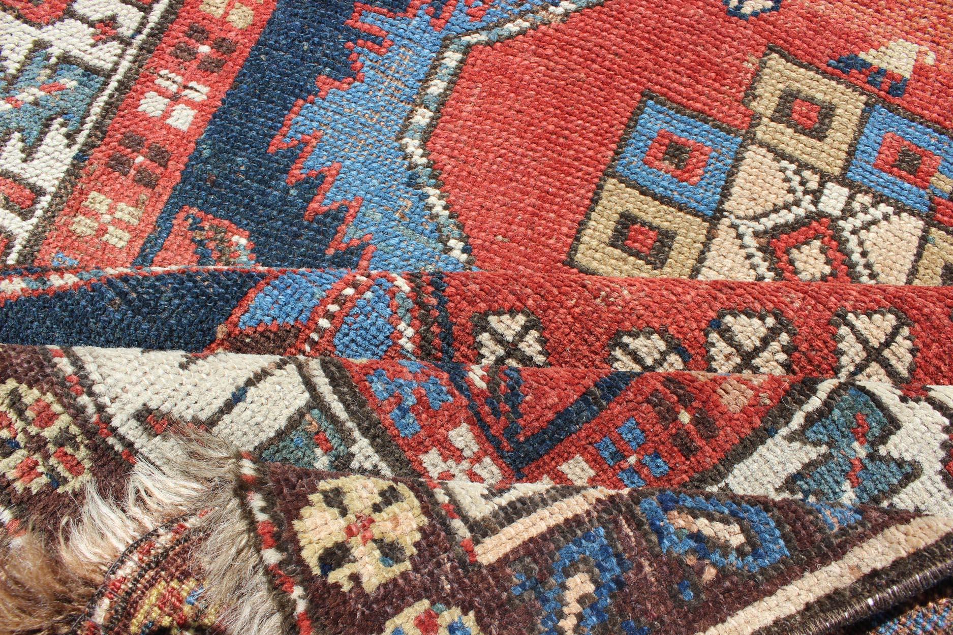 Bold Medallion Design Antique Persian Heriz Runner in Red and Blue Tones In Excellent Condition For Sale In Atlanta, GA