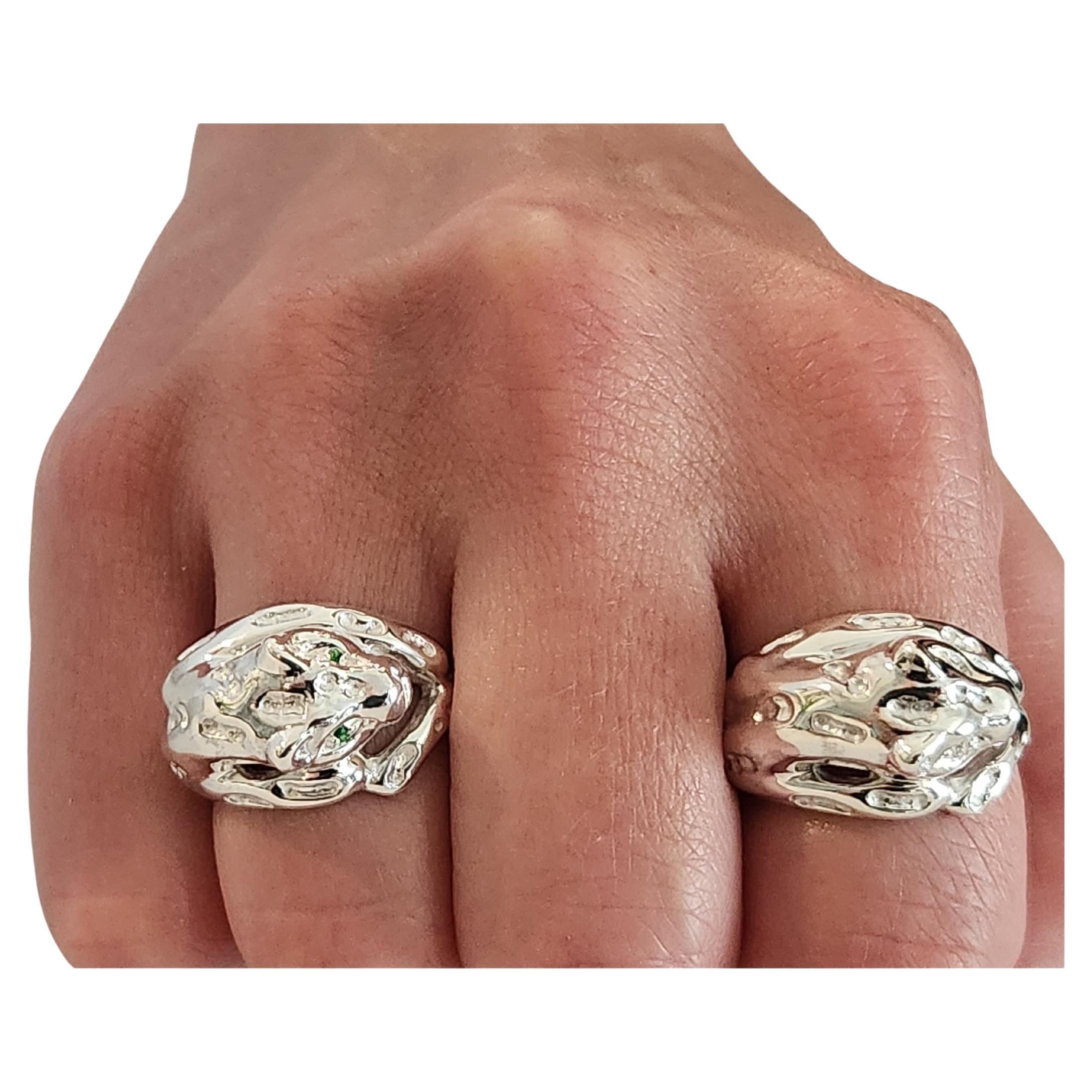 Panthers represent boldness, cunningness, power, and supremacy. What better animal to wear on our finger! The details are realistic and there is a huge Panther hinged cuff as a companion separate piece to add to the collection of our jewelry. The