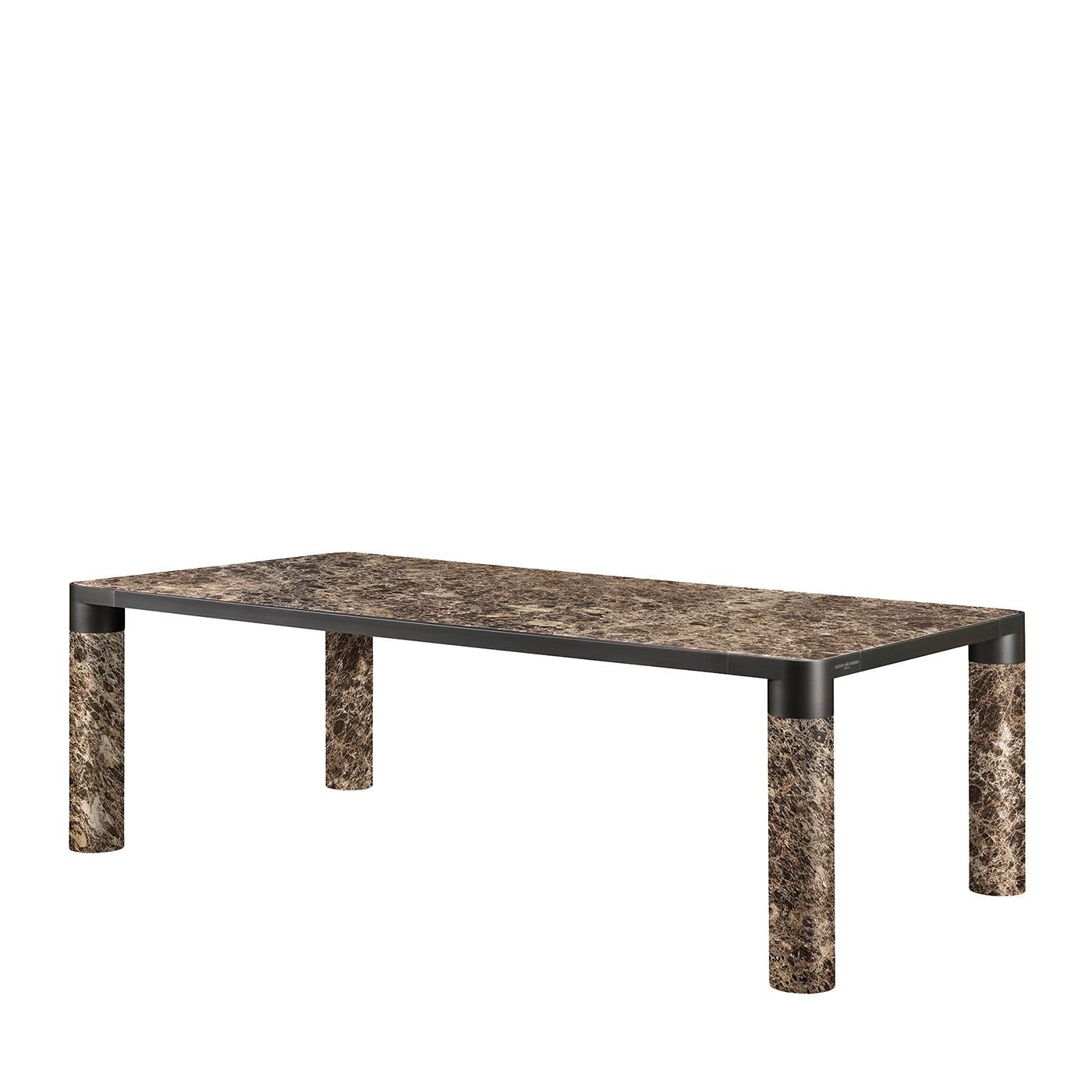 A statement piece that will infuse modern dining rooms with pure luxury, this dining table strikes with the minimalism of its clean lines and preciousness of prized brown marble, here offered in a version characterized by singular, intricate