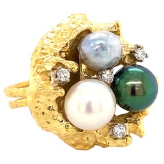 Bold Retro Ring in 14 Karat Yellow Gold with Cultured Pearls and Diamonds