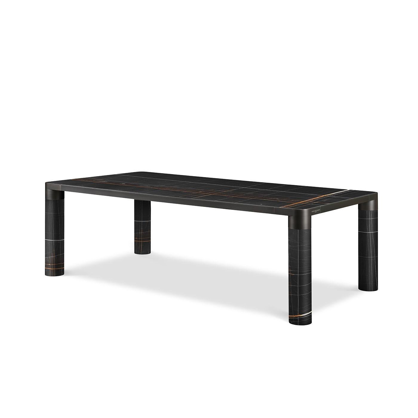 A superb combination of Minimalist design and functional aesthetic, this splendid dining table will have a bold and stately presence in a contemporary dining room. Boasting a Classic rectangular shape resting on four sturdy legs, the piece is