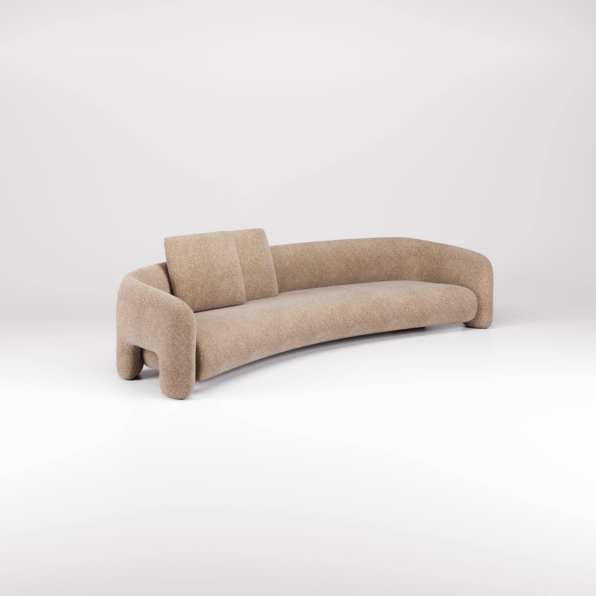 With its contemporary design, this version of the Bold Sofa Curved introduces new dimensions of comfort, offering expanded space for ultimate relaxation.

The fluid lines and organic curves, combined with its open arms feature, further amplify the