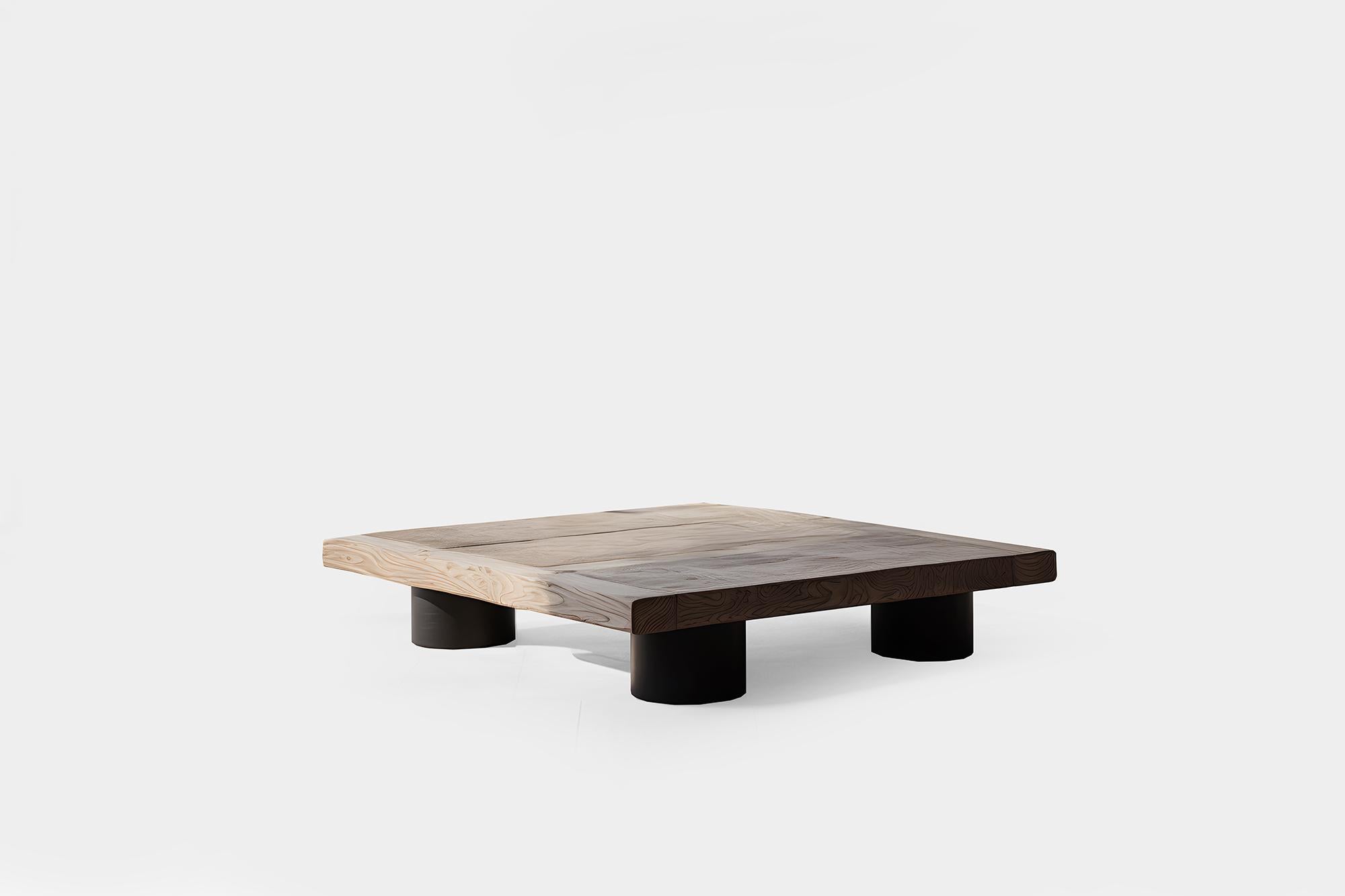 Bold Square Coffee Table in Black Tint - Architectural Fundamenta 29 by NONO

Sculptural coffee table made of solid wood with a natural water-based or black tinted finish. Due to the nature of the production process, each piece may vary in grain,