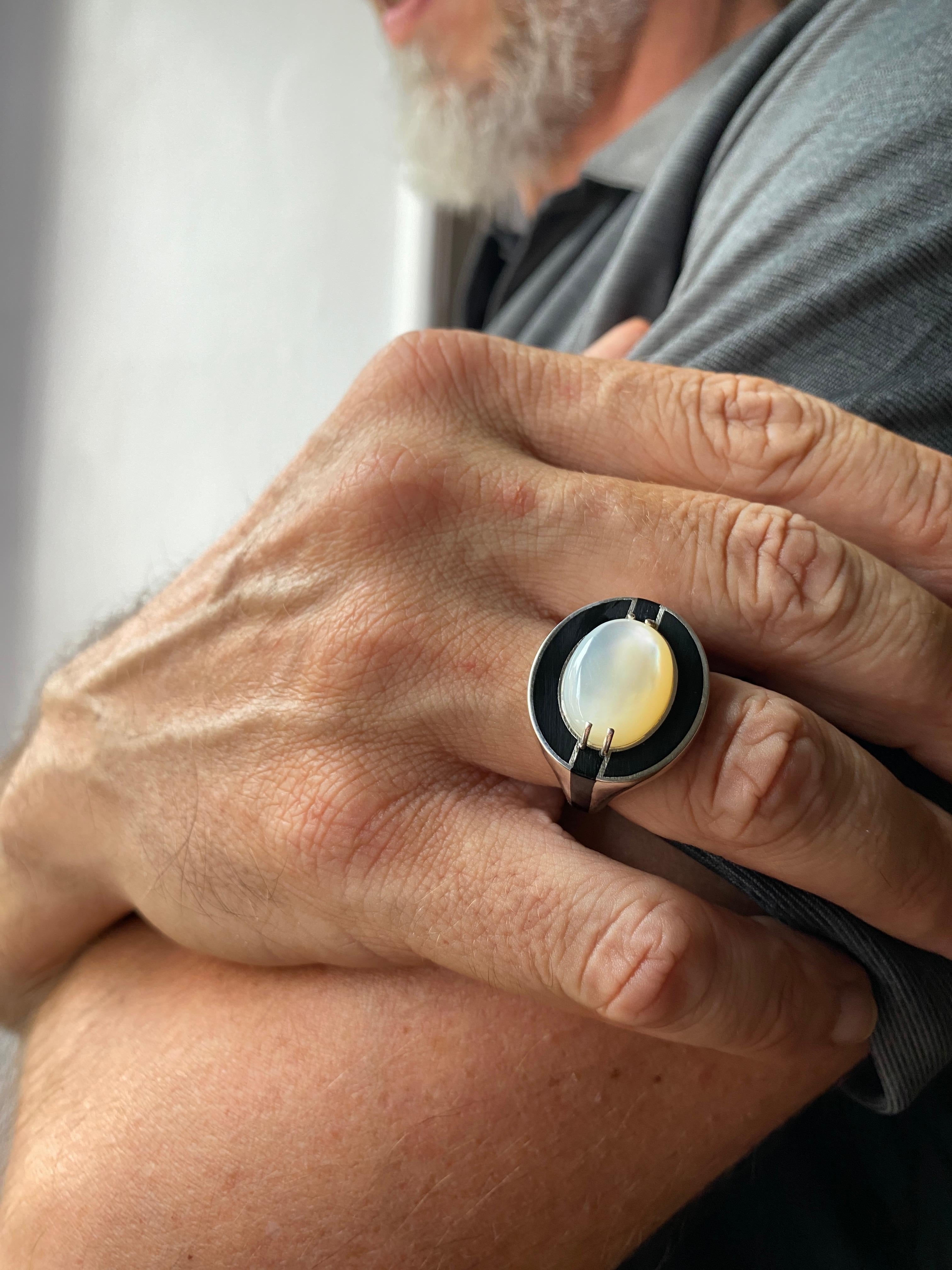 Introducing the exquisite Rossella Ugolini Design Unisex Ring, handcrafted in Italy with utmost attention to detail. This bold and striking ring features a 14K gold oval cabochon adorned with a large moonstone, symbolizing mystery and intuition.