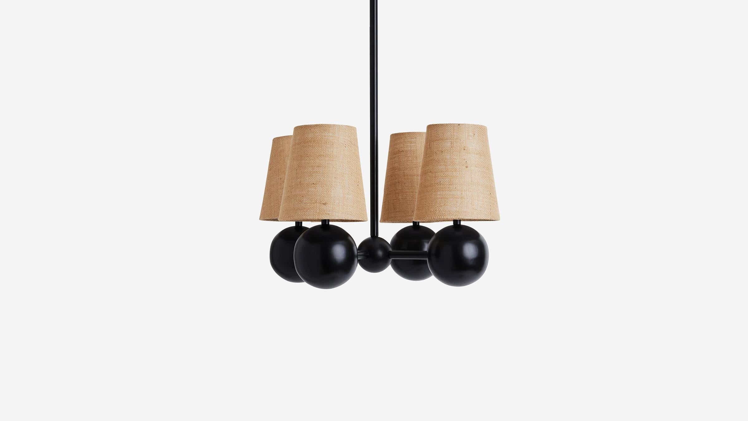 BOLE PENDANT IV floats four robust spheres and their hovering shades pulled together by a substantial center point. Providing ample amounts of light this fixture brings both weight and levity to any dining or entertaining space. UL, cUL, CE Listed.