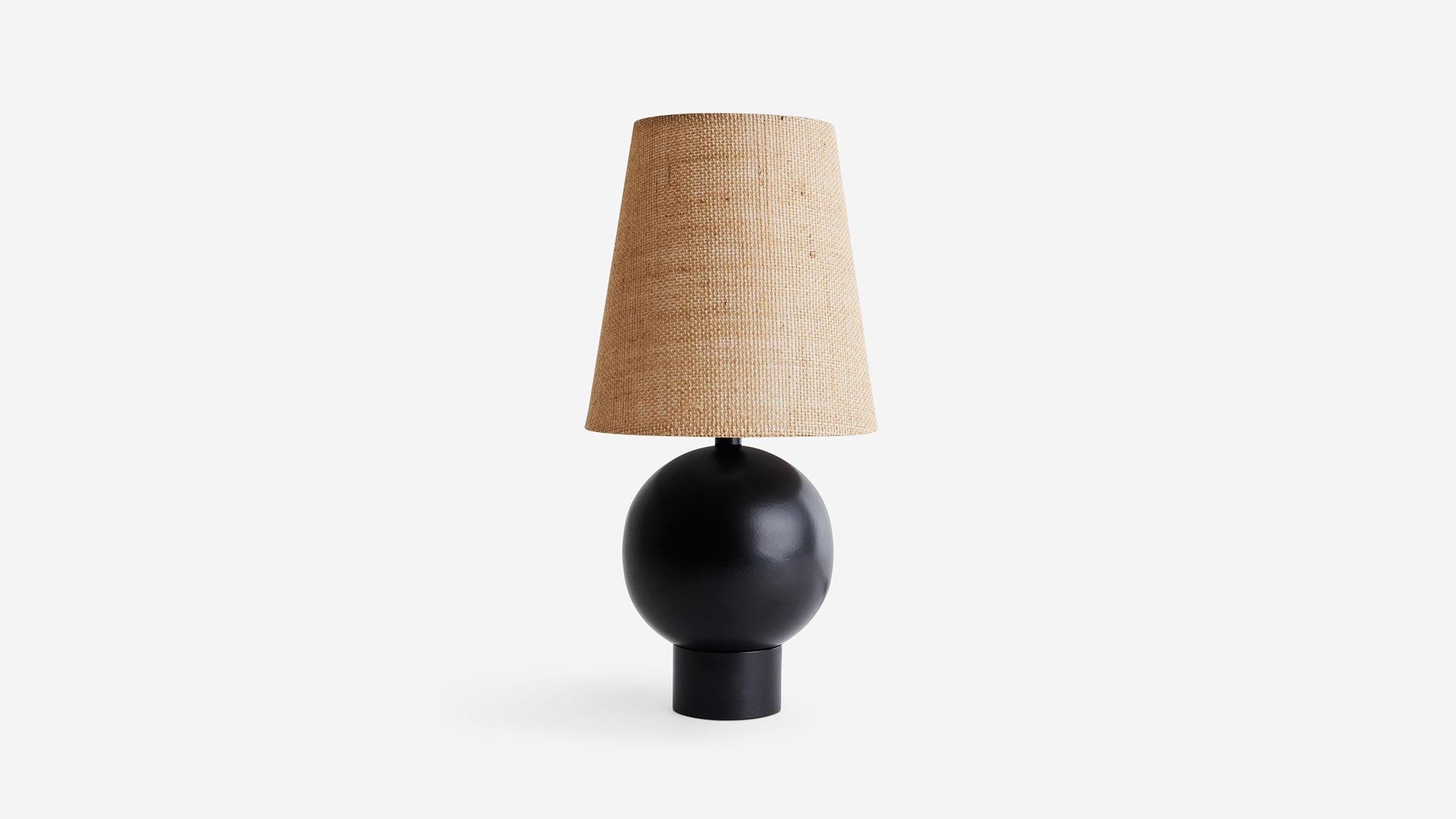BOLE TABLE LAMP brings the sturdy globe of the BOLE collection down to eye level. With its confident proportions this table lamp sits comfortably as the center of attention or tucks away to illuminate the unexpected. UL, cUL, CE Listed. Damp Rated.

