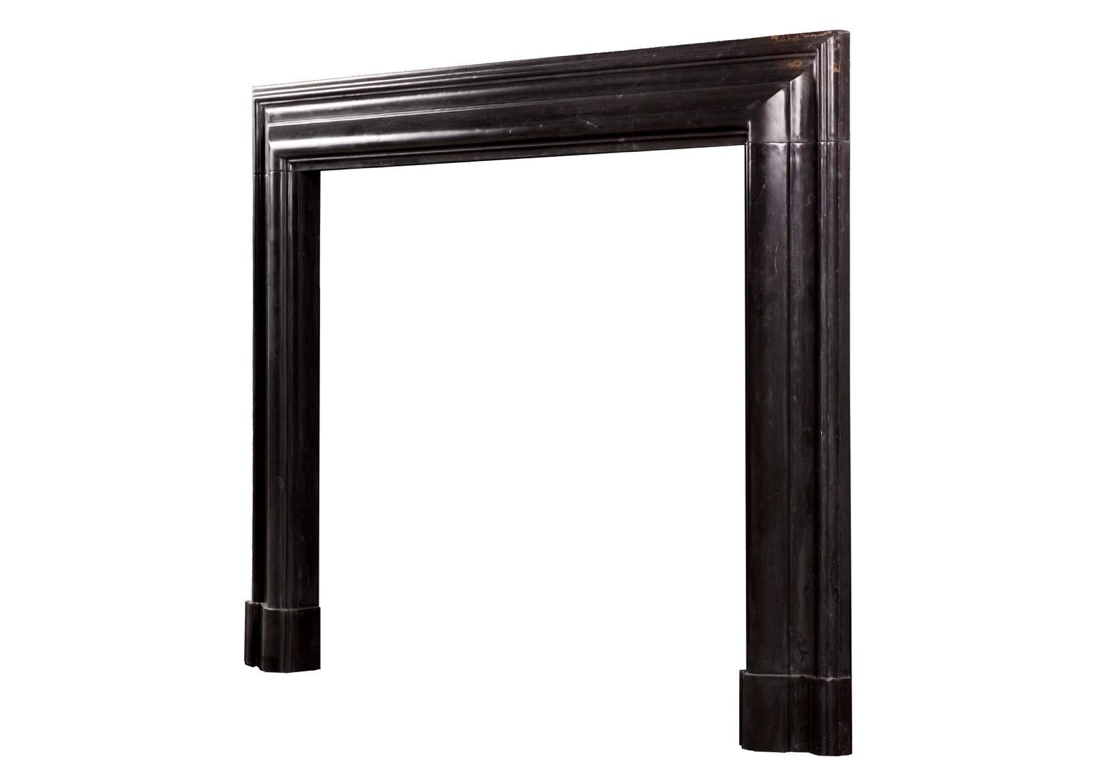English Bolection Fireplace in Black Marble For Sale