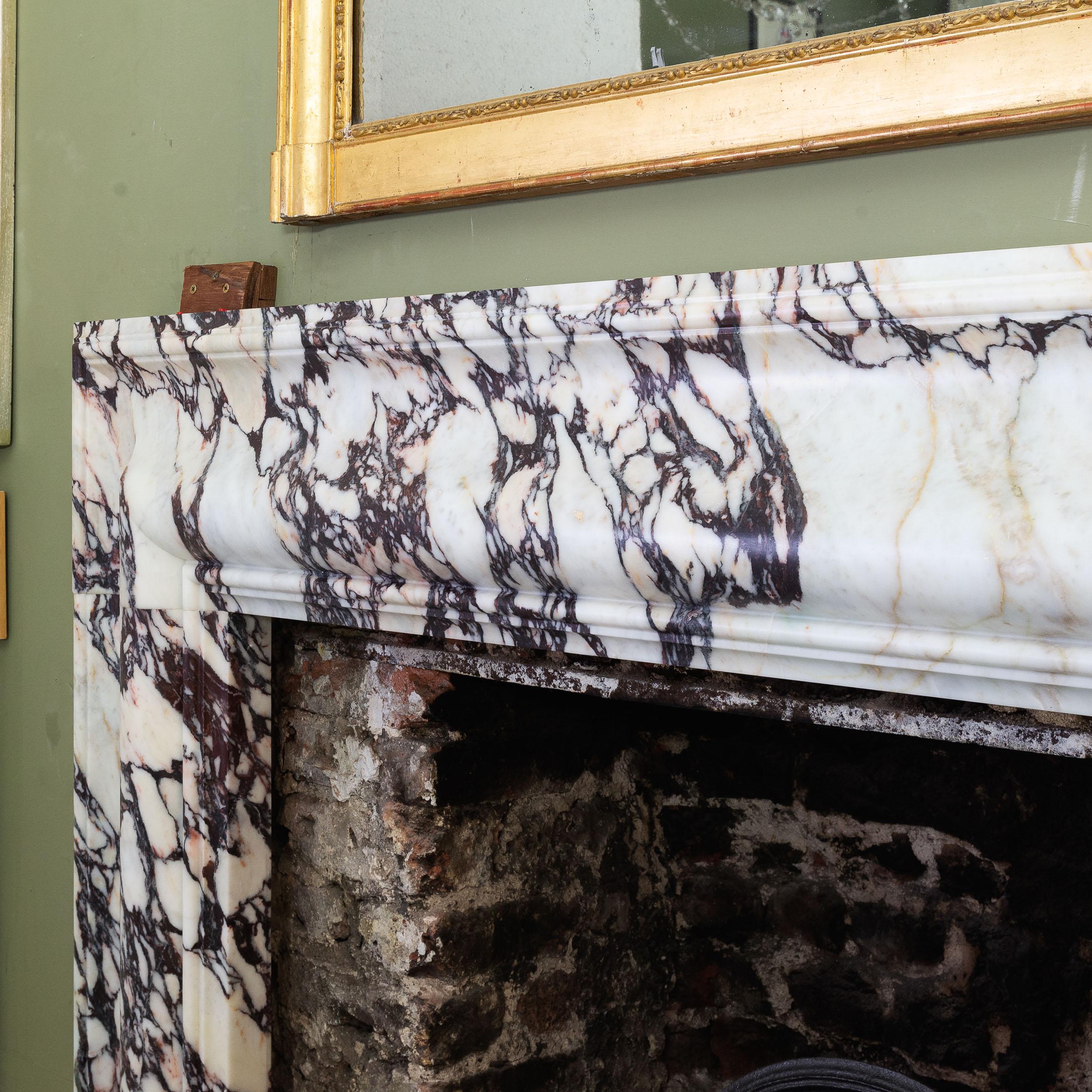 Contemporary Bolection Fireplace in Breccia Viola Marble
