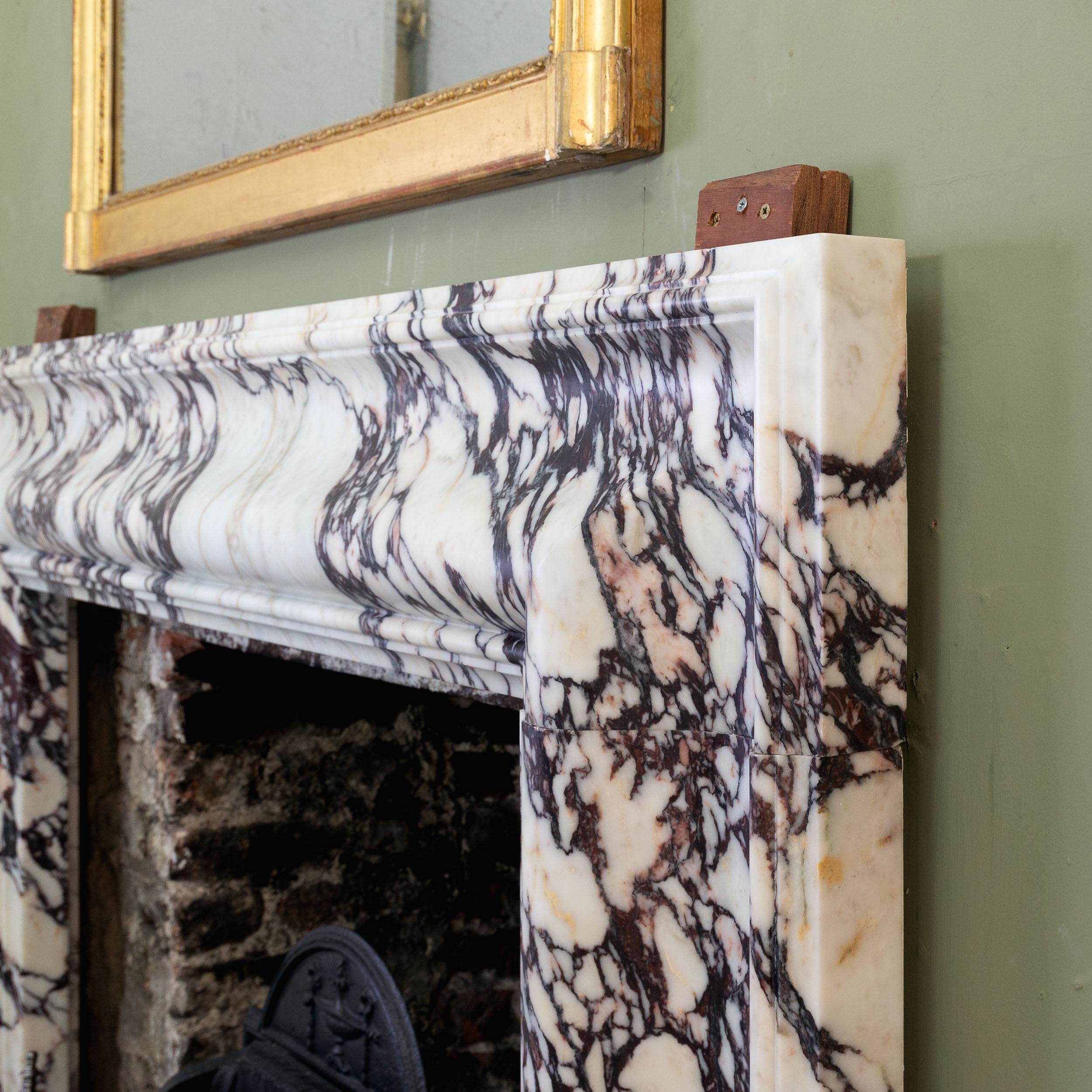 Breccia Marble Bolection Fireplace in Breccia Viola Marble