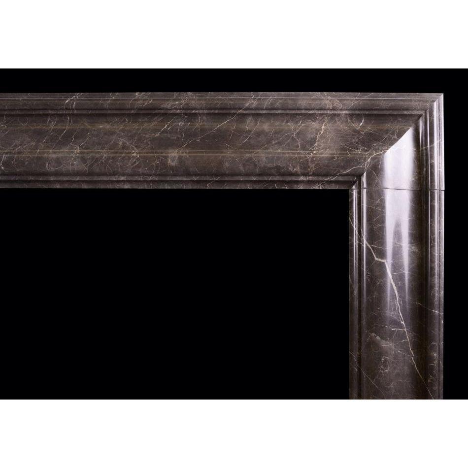 A good quality bolection fireplace in Elegant Grey marble. Moulded jambs and frieze in the Queen Anne style. An attractive marble. Modern.

Additional information:
Shelf Width: 1425 mm / 56 ?