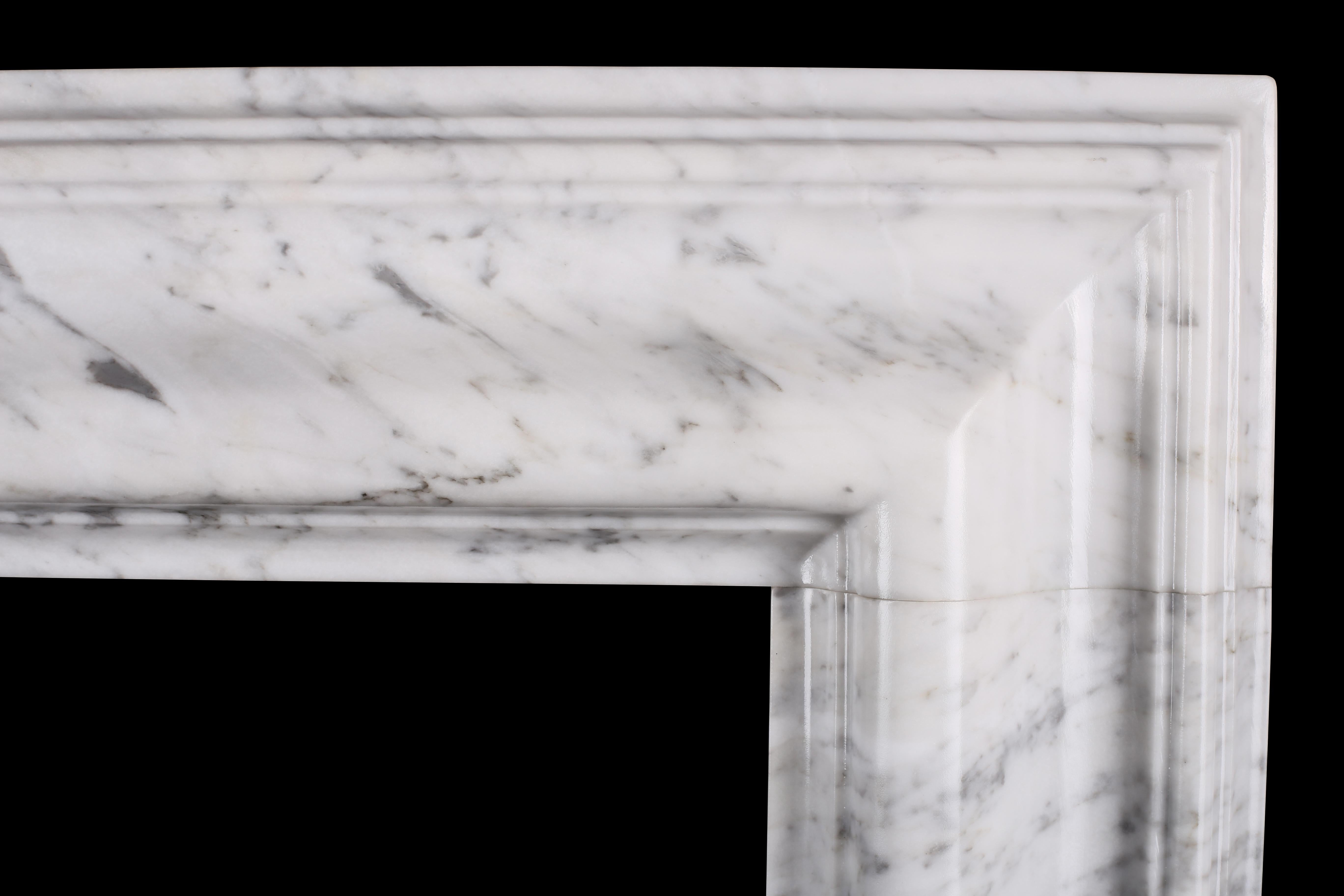 Contemporary Bolection Fireplace in Italian White Carrara Marble For Sale