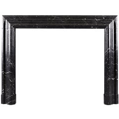 Bolection Fireplace in Nero Marquina Marble