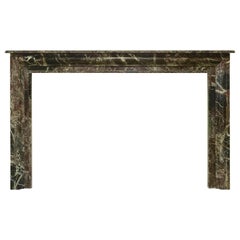 Bolection Fireplace in Striking Levanto Rouge Marble