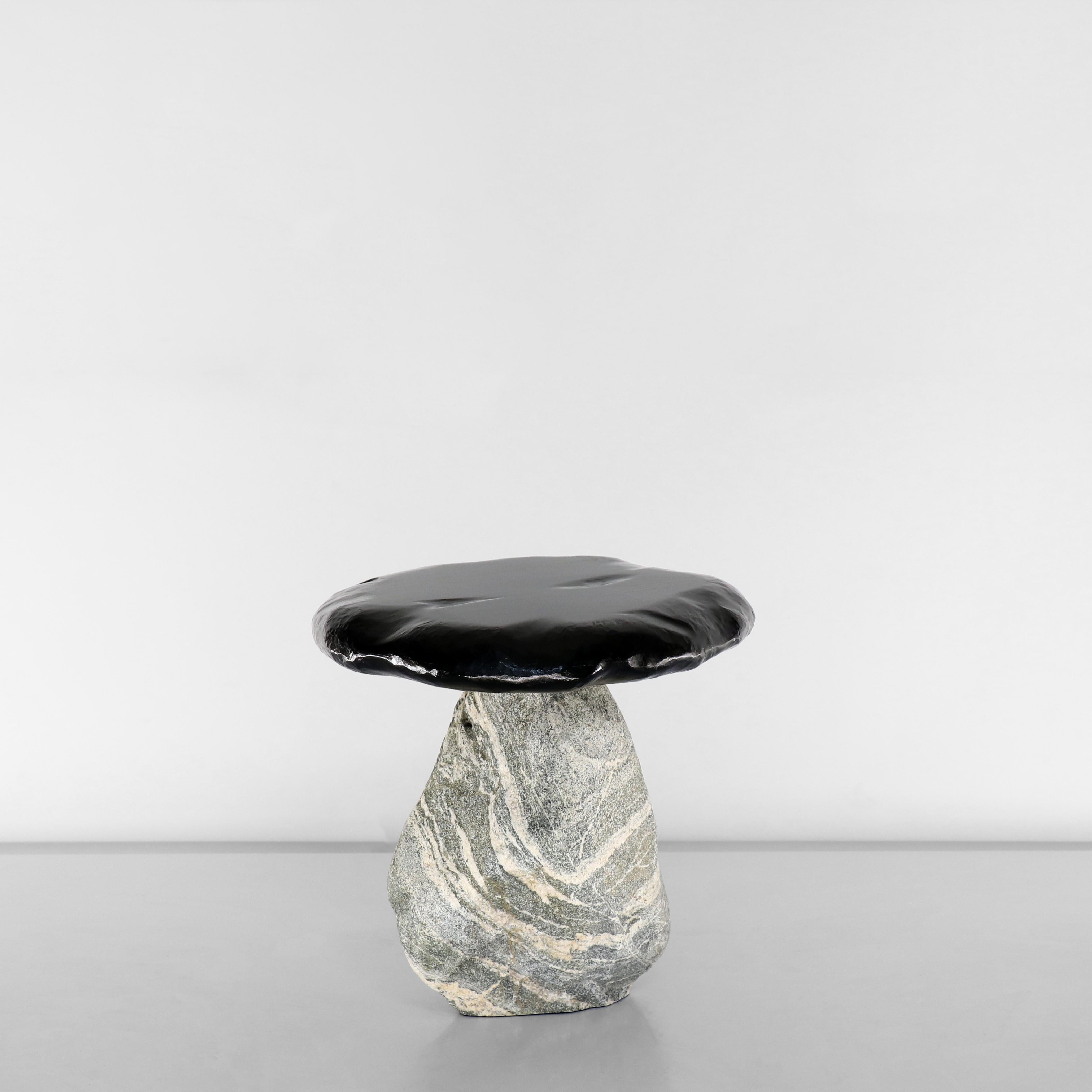 Bolete Side Table by Henry D'ath
In collaboration with Batten and Kamp
Dimensions: D 40 x W 45 x H 45 cm
Materials: Wood, granite.
Available in natural or black ink finishes.

The Bolete side table. A serendipitous pairing of elements defined