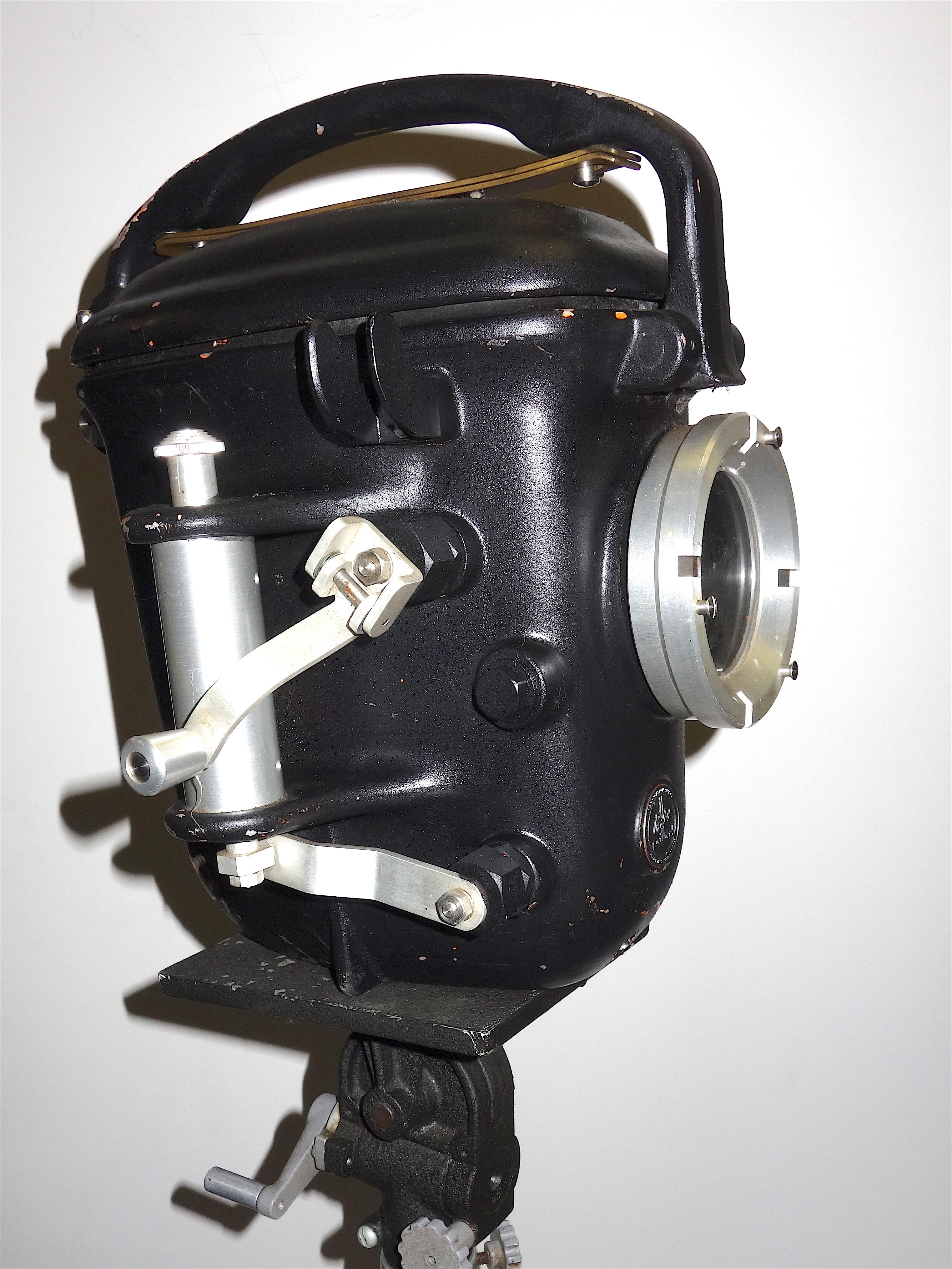 Offered here for your perusal is this circa 1950s Bolex - Paillard Swiss Made 16mm underwater camera housing on a mid century Majestic crank up metal tripod with a geared pan head.

Showing the scars of underwater cinematography during its