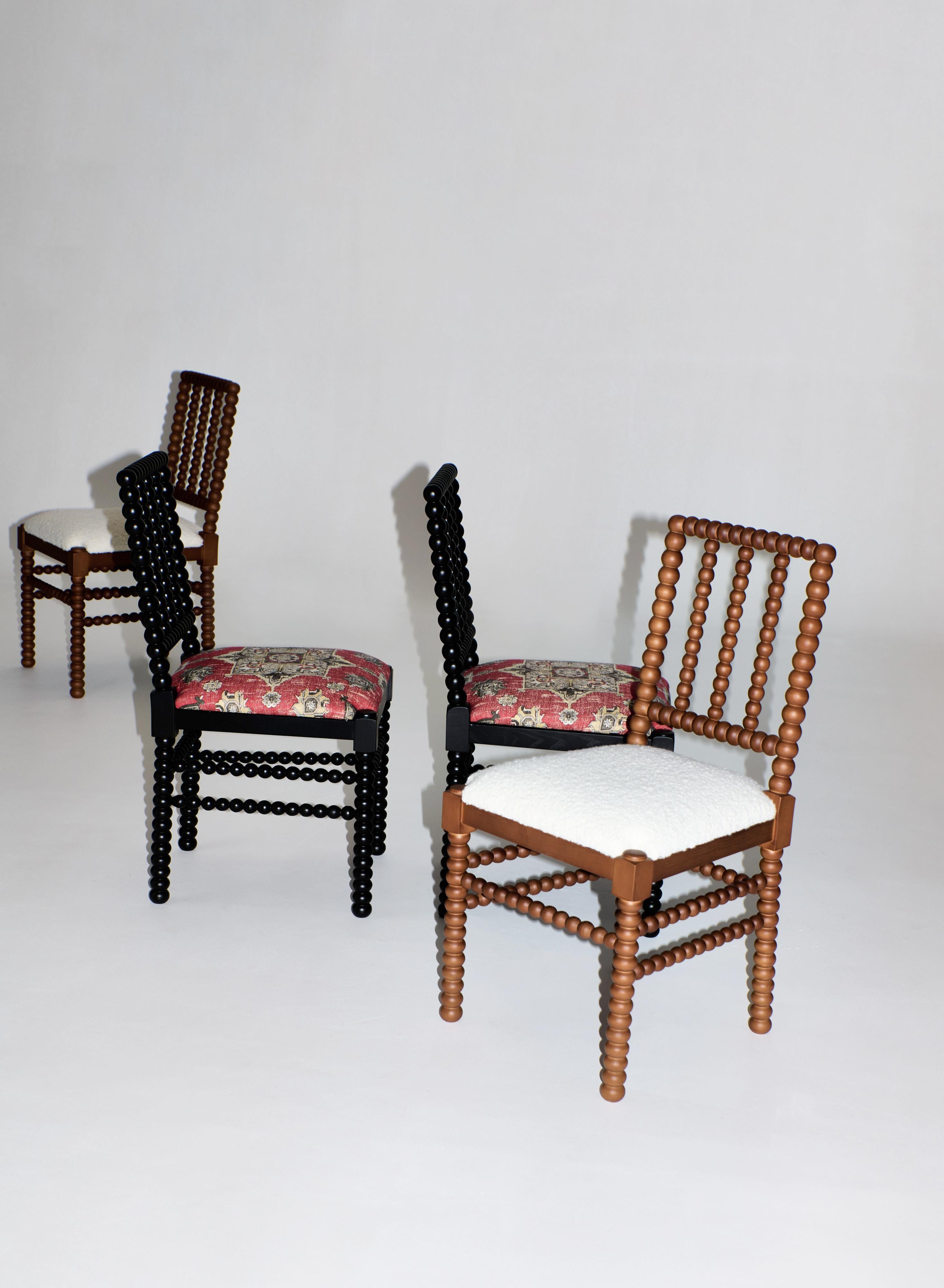 BOLHA CHAIR, designed in 2025

This chair is part of the Bolha series with elegant wood-turned detailing and an upholstered seat. Crafted by skilled artisans in Northern Portugal.

Please inquire to view other wood options.

Production lead time: