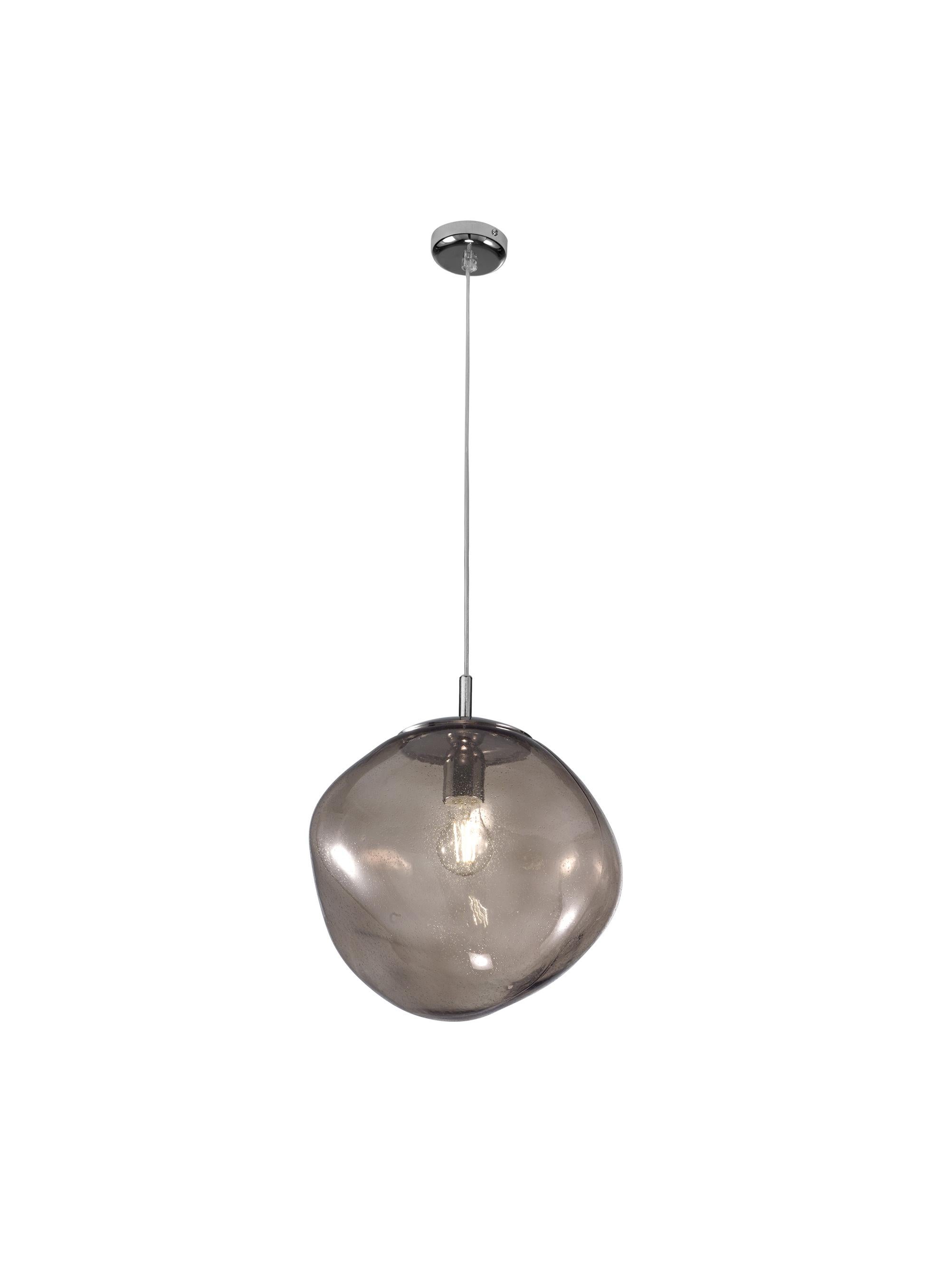 Modern Italian pendant with a smoky glass shade in a organic spherical form, suspended from clear cable and chrome hardware / Made in Italy by Fabio Ltd
Diameter: 14 inches / Height: 15 inches plus cable and canopy
1 light / E26 or E27 type / max